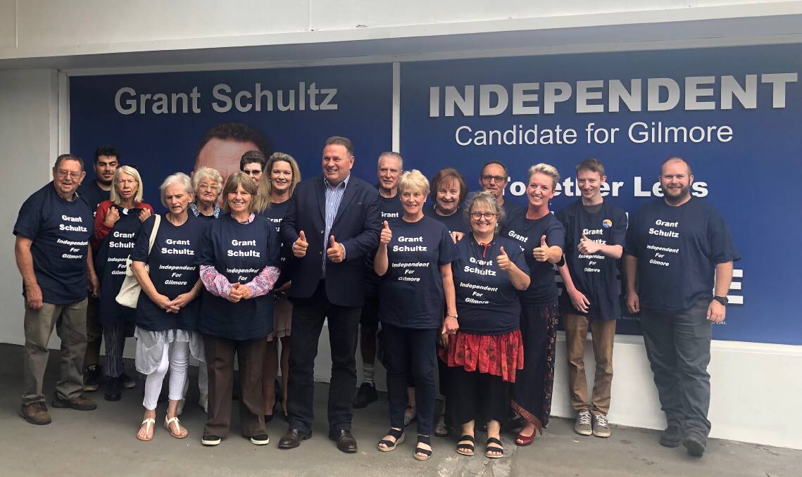 Gilmore Independent Candidate Grant Schultz and some of his supporters in Nowra at the official opening of his office on Wednesday. Greg Stenton is second from right.