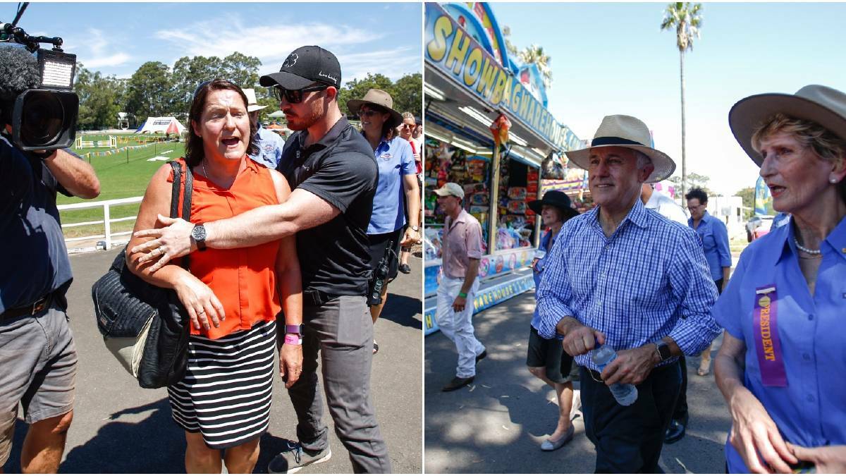 Labor's Fiona Phillips is removed by security after confronting Malcolm Turnbull during Friday's Nowra Show visit. Pictures: Adam McLean
