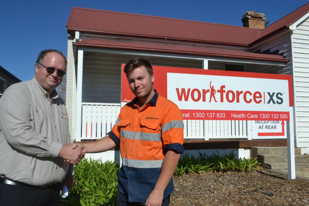 Workforce XS representative Ross Thompson and Jervis Bay worker Will Scheibe at the opening of the new Worrigee Street office. Picture: Rebecca Fist