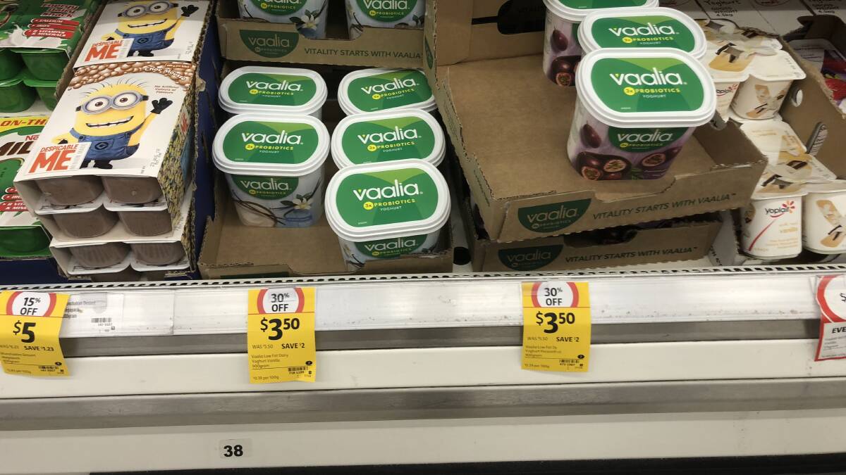 PRICE CUT: The shelves in Coles on Monday, August 6, showed the price of Vaalia yogurt, which Robert Miller's milk is used in, slashed by 30 per cent. 