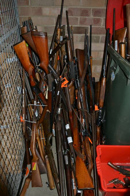 Some of the 200 firearms handed into Shoalhaven police.