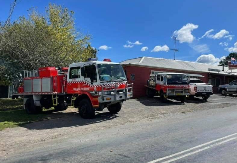 PRIDE OF PLACE: Rural Fire Service vehicles take pride of place in front of the Nerriga Hotel during the 