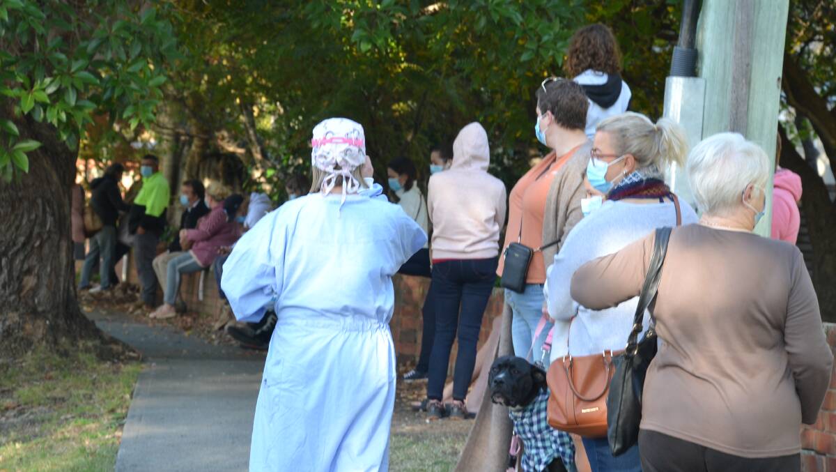 LINE UP: People lined up for COVID-19 testing at Shoalhaven District Hospital.