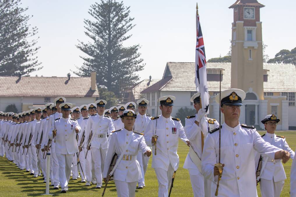 New entry officers course graduates march off the parade ground at HMAS Creswell on completion of their graduation parade. Photo: Cameron Martin
