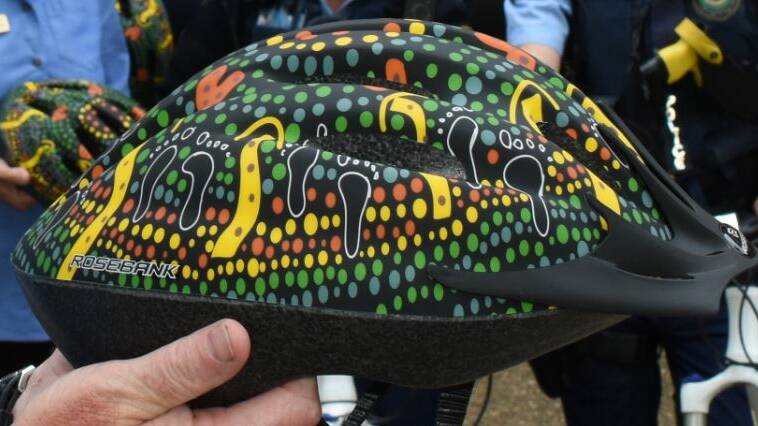 One of the stunning helmets designed by Aboriginal RMS staff member Mark Hartwig.