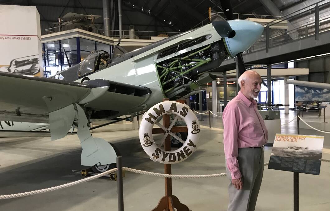 OLD BIRD: Royal Navy pilot David Eagles in front of a Fairey 'Firefly' anti-submarine aircraft at the Fleet Air Arm Museum.