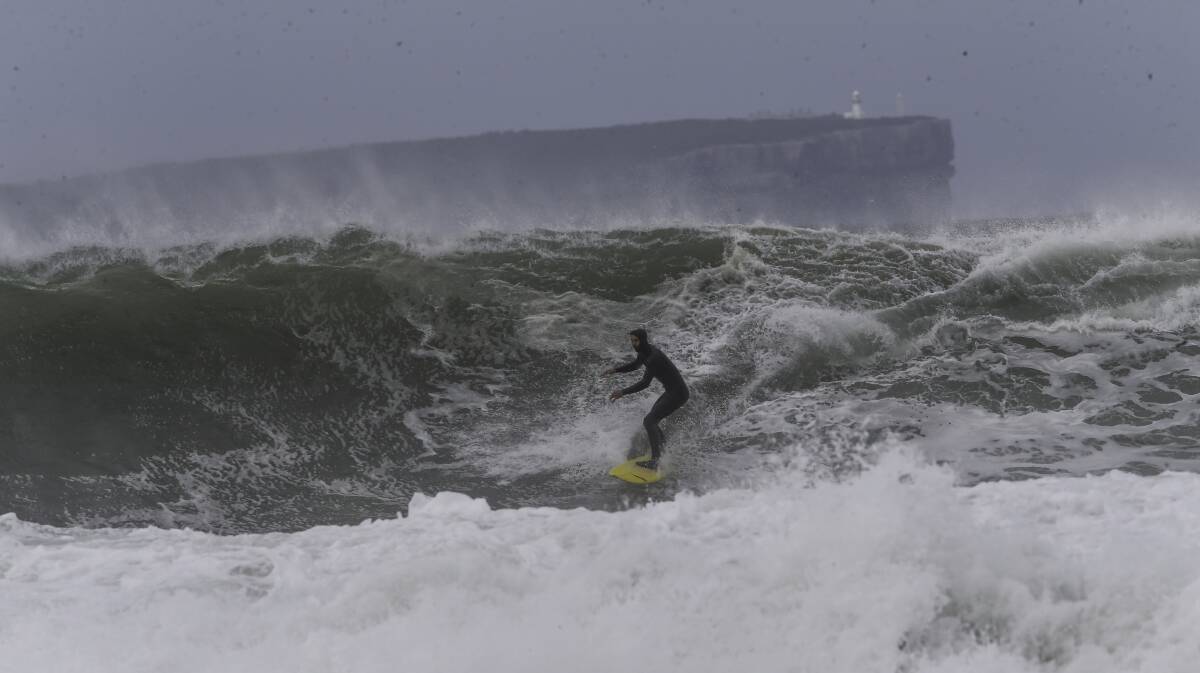 SURF'S UP, COL'S OUT: Col was right at home capturing the surfers in action recently when a weather system produced big surf inside Jervis Bay.