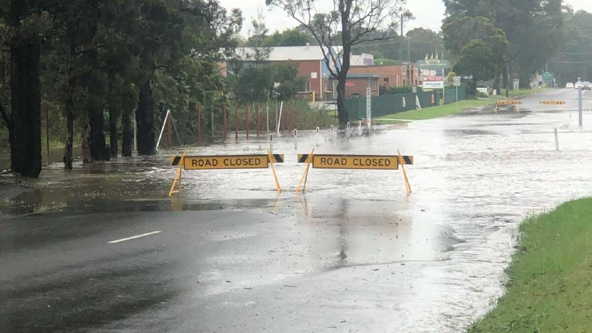 CLOSED: Quinns Lane at South Nowra is closed due to water over the road. Photo: SES Nowra