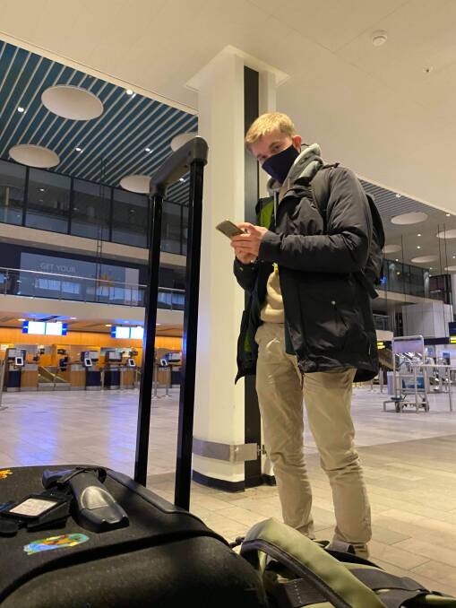 HOMEWARD BOUND: Shoalhaven's Saxon Perry waiting to board his plane home in the Denmark capital Copenhagen.