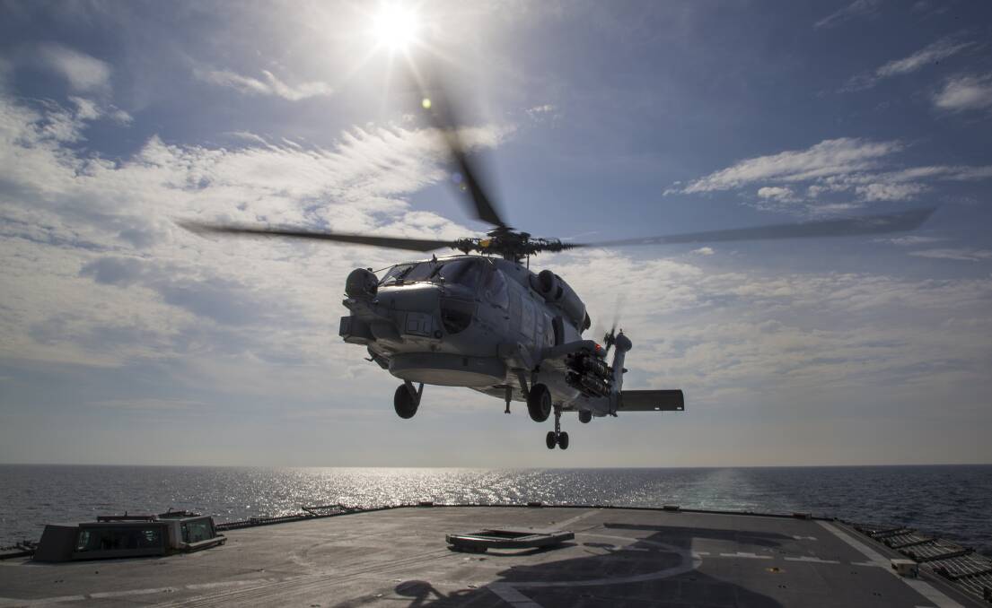 GROUNDED: The navy's fleet of MH-60R Seahawk Romeo helicopters based at HMAS Albatross have been grounded after a crew were forced to ditch in the Philippine Sea. The three aircrew were rescued, suffering minor injuries. Photo: Bradley Darvill