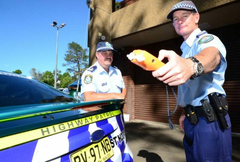 BUSY TIME: Shoalhaven Highway Patrol Commander, Sergeant Mick Tebbutt (left) and Leading Senior Constable Kelly Thomas have been out on the roads over the busy holiday period.
