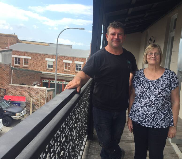 PLANS: Maurice Bertapelle, from Iconic Property Holdings, part of the Iconic Group, which is undertaking the makeover of the historic Spotlight building in Nowra with Shoalhaven Historical Society president Lynne Allen.