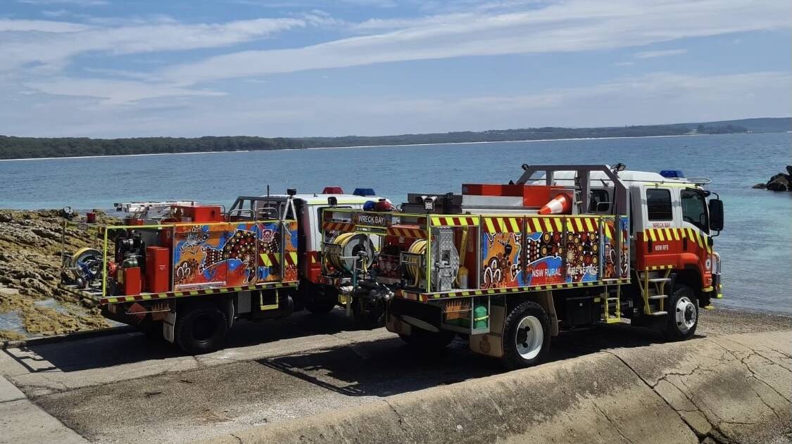 LOOKING GOOD: Wreck Bay Rural Fire Services two tankers which have had indigenous artwork installed on them.