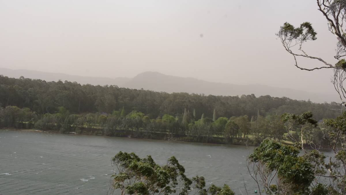 The thick pall of dust that covered large parts of the Shoalhaven on Tuesday, blown in by the strong winds. Cambewarra Mountain and parts of the escarpment was almost invisible due to the dust.
