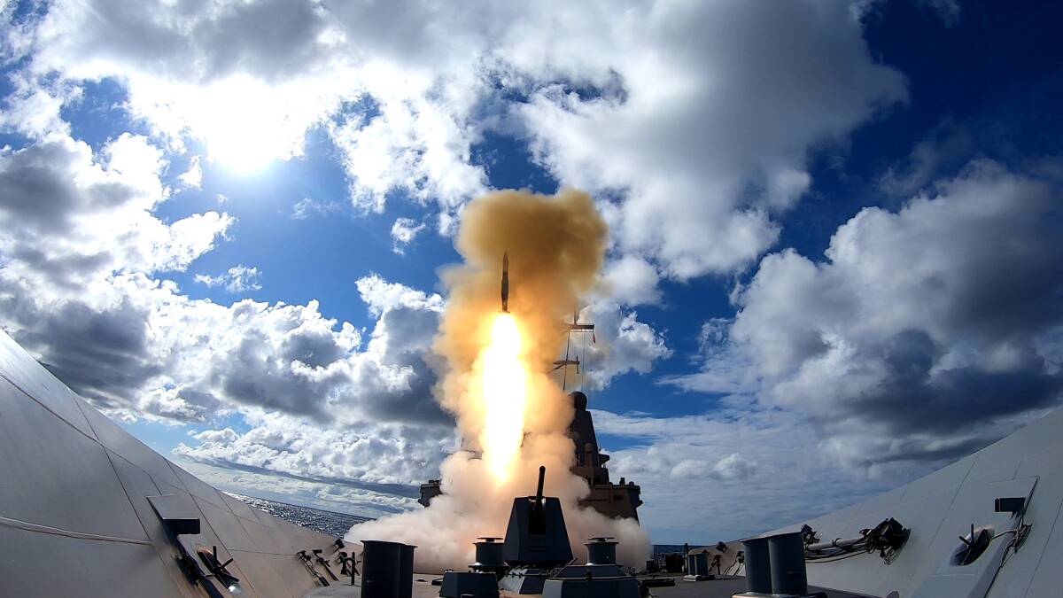 AIRBORNE: HMAS Hobart conducts a live fire exercise using the vertically launched RIM-66 Standard Missile 2 (SM2) as a test of capability before proceeding to their Unit Readiness Evaluation (URE). Photo: Christopher Szumlanski 