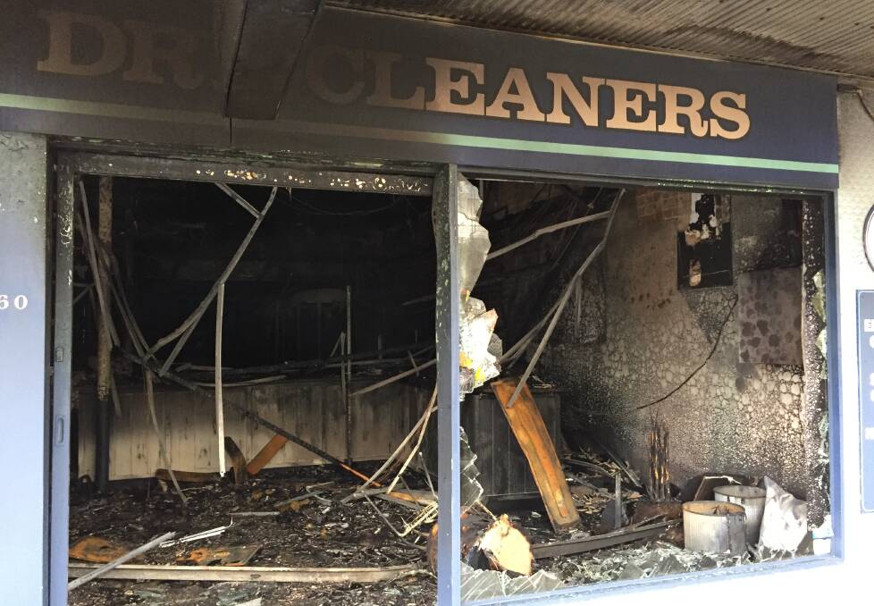 DESTROYED: Lyrebird Dry Cleaners in Kinghorne Street in the Nowra CBD has been destroyed in an early morning fire.