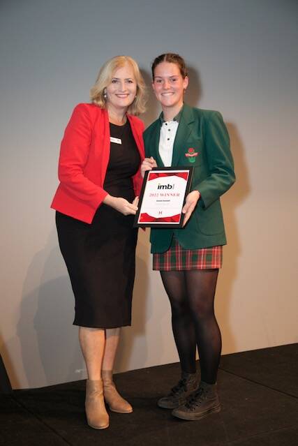 AWARD: Bomaderry High's Georgie Goodsell accepts her Harding Miller Education Foundation Scholarship from foundation National Operations Manager Cathy Johnstone. Photo: Jason Nichol 