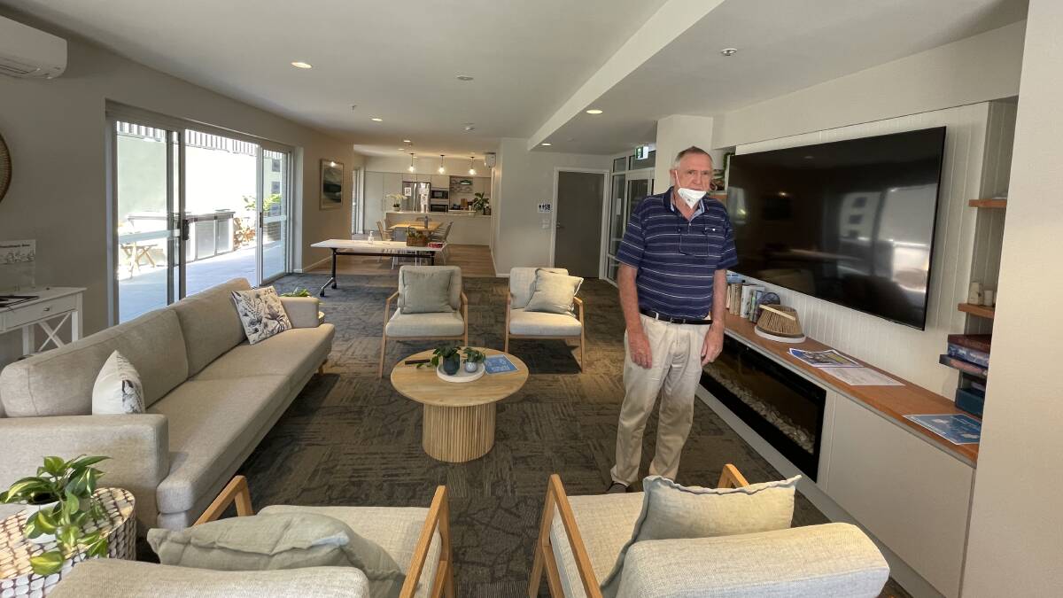 TOP FACILITY: Resident John Smith in the large community activities room in Symons House.