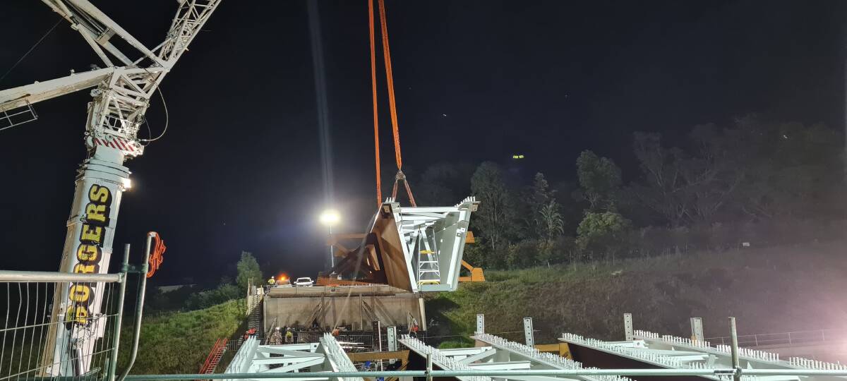 BIG LIFT: Girders are put in place over Strongs Road as part of the Berry to Bomaderry upgrade.