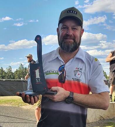 YOU BEAUTY: Shoalhaven's Nathan Alcock proudly shows off his first place trophy from the State Butchers' Competition won by NSW at the weekend.
