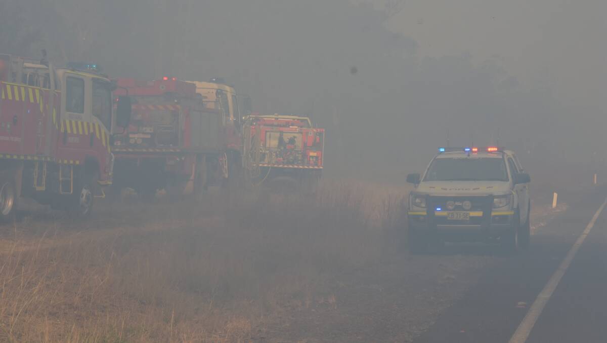 RFS crews have battled windy conditions and thick smoke most of the day at the Braidwood Road fire at Yerriyong.