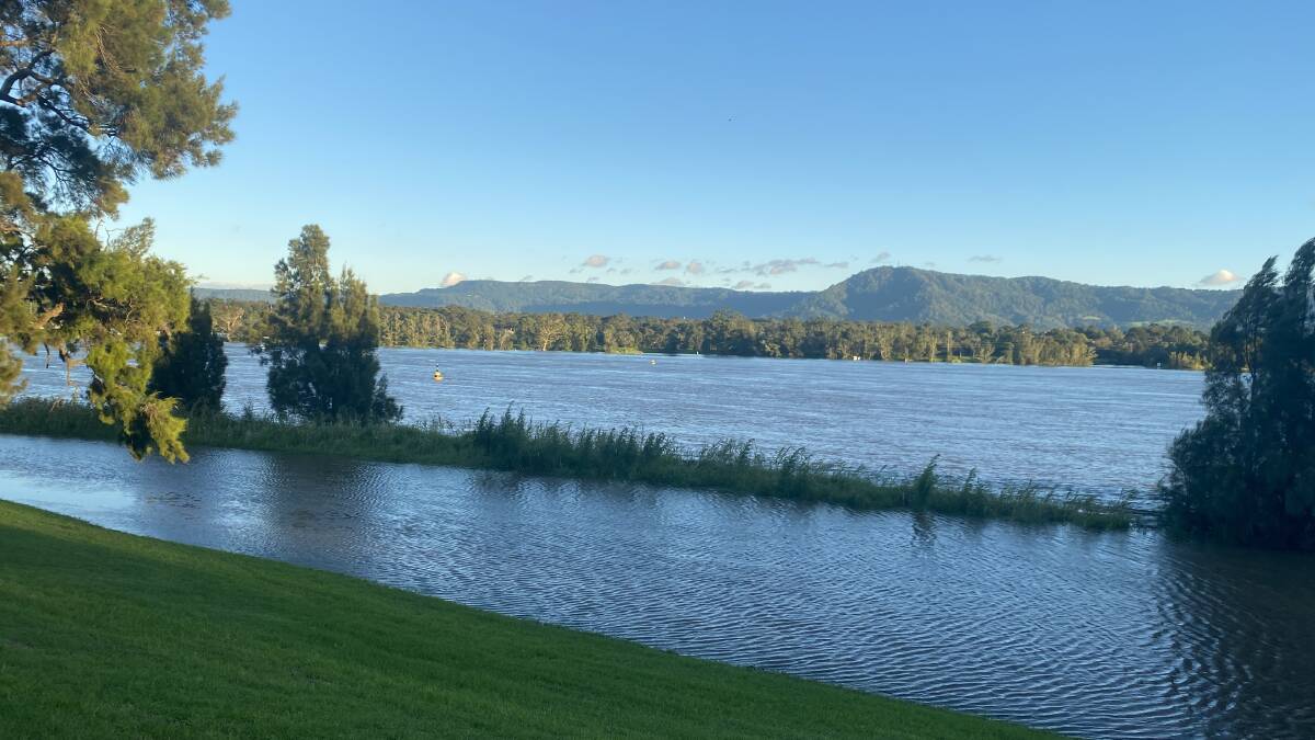 JUST OVER: Shoalhaven River water levels at Nowra along Riverview Road has just broken over its banks. Photo: Grace Crivellaro