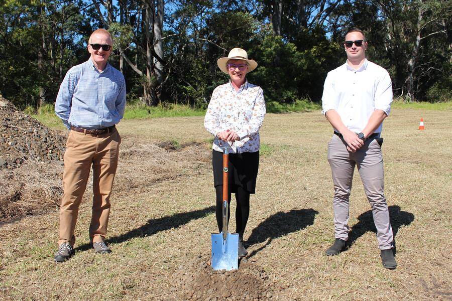 READY, SET, GO: Shoalhaven City Council's Mayor Amanda Findley (centre) turns the first sod of the North Collector Road Project with council's Strategic Planning section manager Gordon Clark (left) and acting unit manager design Micaiah Tipton.