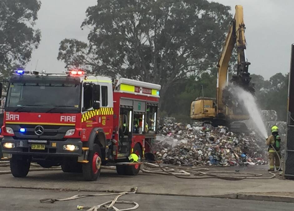 Fire crews were at a Bomaderry recycling facility fire for more than seven hours on Wednesday morning.