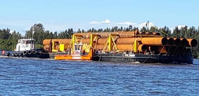 SPECTACUlAR SIGHT:: Local Noel Kennedy captured the barge and its pile casings load on the Shoalhaven River on Monday afternoon.