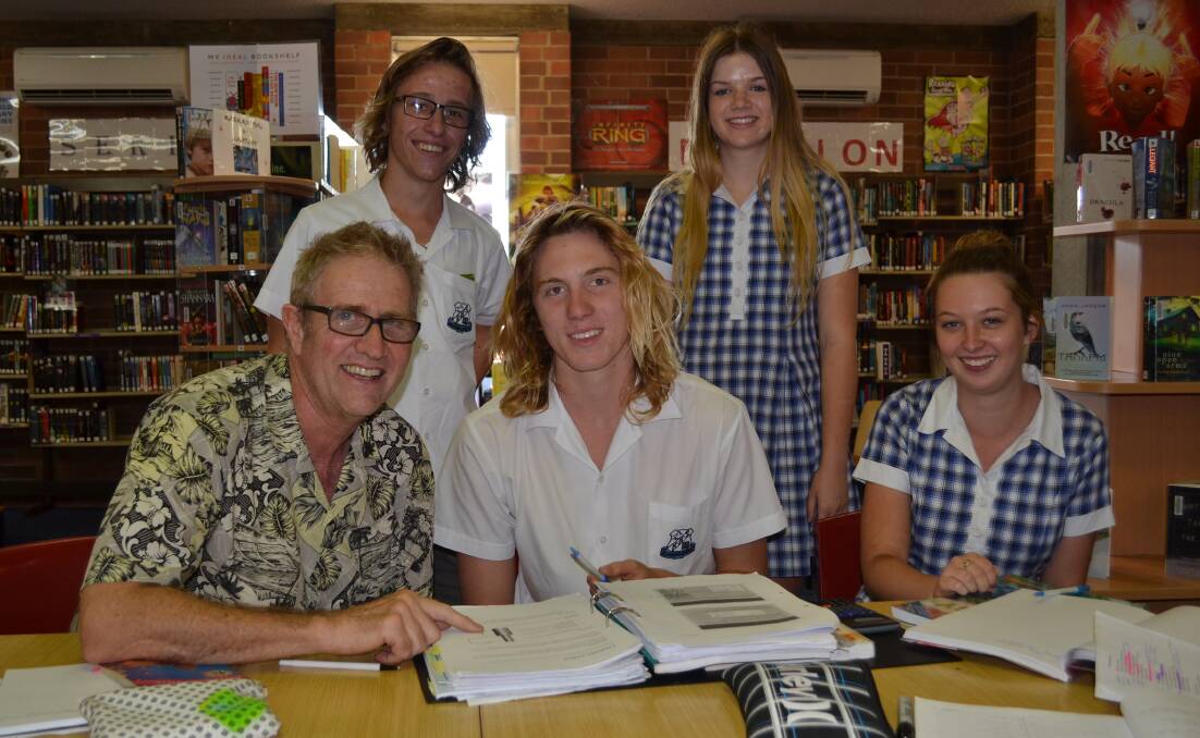 Retiring teacher Paul Murphy with one of his study groups.
