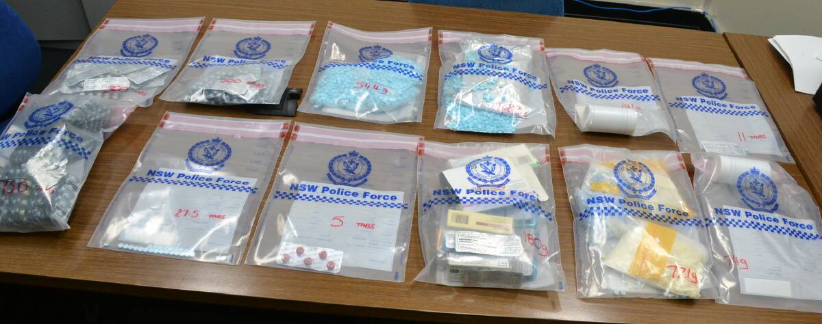 DRUGS: Some of the prescription drugs seized in Wednesday's arrest.
