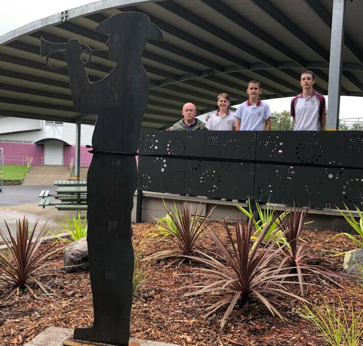 GREAT WORK: Teacher Harry Sawkins and Gumbari Unit students who did a fabulous job with the planting and mulching the garden.
