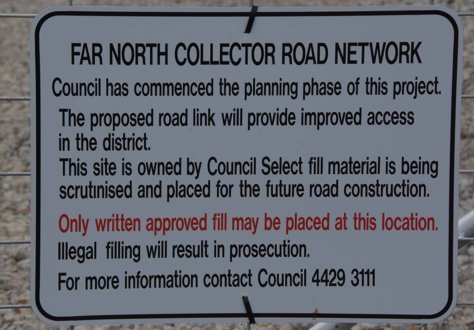 A sign at the property off Illaroo Road alerting locals to the work starting the Far North Collector Road Network.
