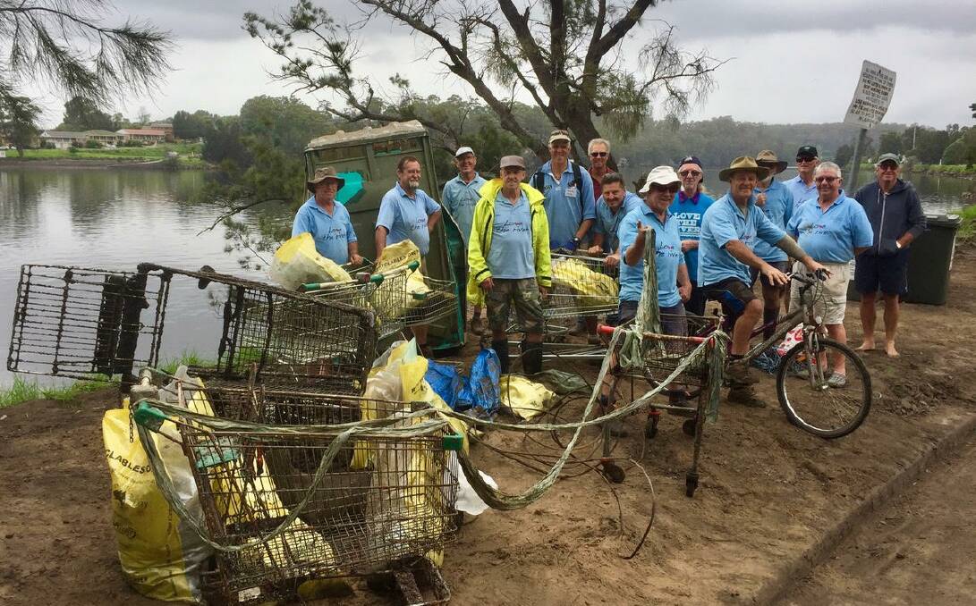 TOP EFFORT: Shoalhaven Riverwatch members Ron Cowlishaw, Ray Davey, Peter Jirgens, Michael Ware, Graeme Searle, Allan Lugg, Peter Dalmazzo, John Miskelly, Dean Small, Peter Hanson, Peter Johnson, John Tate, Tim OShea and Jack Rodden with some of Tuesdays clean-up haul.