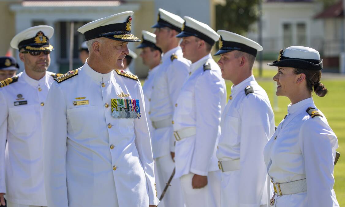 ON SHOW: Reviewing Officer and Commander Maritime Border Command Rear Admiral Lee Goddard, CSC, inspects the guard during the New Entry Officers Course 63 graduation parade at HMAS Creswell in Jervis Bay. Photo: Cameron Martin