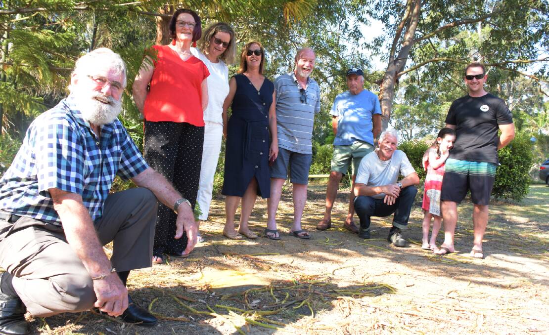 UNITED: Bangalees Dennis Johnson with fellow residents (from left) Carol Johnson, Averil Button, Julie Jones, Bob Death, Cliff Haigh and Brodie Bolton with his daughter Amelia are calling for a Community Fire Unit (CFU) to be established near a hydrant at the end of their street.