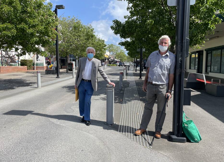 CLOSED: Junction Court in the Nowra CBD will be closed for two months as of Monday, October 11. John Macey (left) and John Bowden, local property owners, are pictured at the eastern end of the Junction Court.
