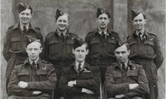 CREW: George Lamond (RAAF) (centre front) with his Halifax crewn (back from left) Tom Finny (RAF), Terry Philpot (RAF), Gordon Downie (RAF), Harry Venning (RAF). Front: Gordon Scott (RCAF) and Fred Bear (RAF).