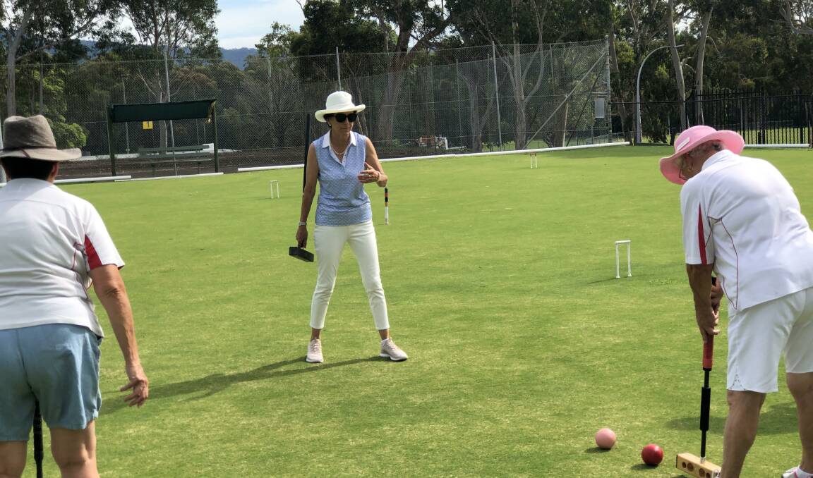STAR TEACHER: Shoalhaven croquet players taking part in coaching clinics with former world number one player Alison Sharpe at the Nowra Croquet Clubs courts at Bomaderry. Photos: Bob Williamson