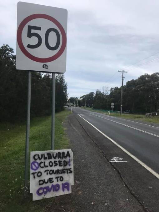A sign on the entry to Culburra Beach, east of Nowra, declaring the seaside village "closed to tourists" due to COVID-19. Image: Facebook
