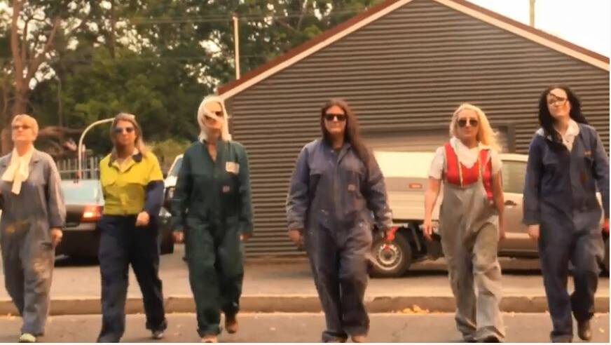 The Shoalhaven librarians swapped books for overalls to star in Get Your Motor Runnin'. .

