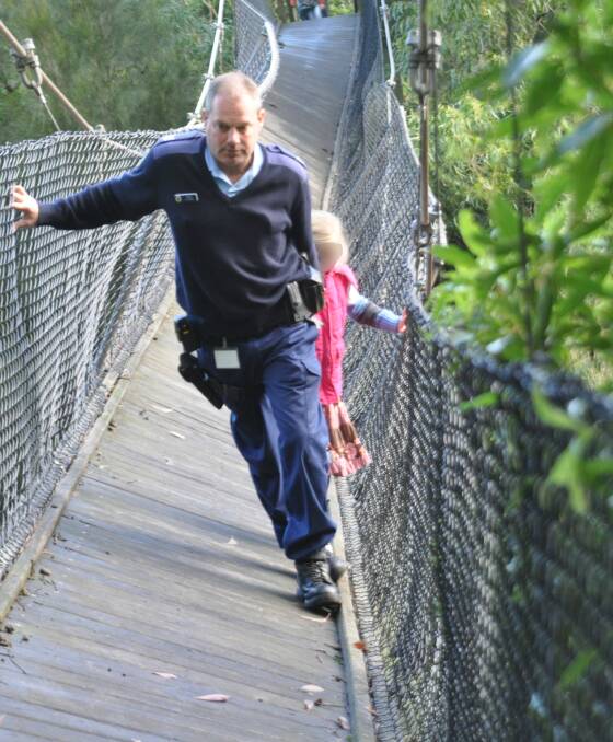 Former Nowra cop, Sergeant Nigel Davey took part in the rescue of a family in Nowra when cables on the Nowra Creek suspension bridge came loose in June 2013. Davey was last week jailed for perjury after an assault with a Taser. Photo: Frances Rand