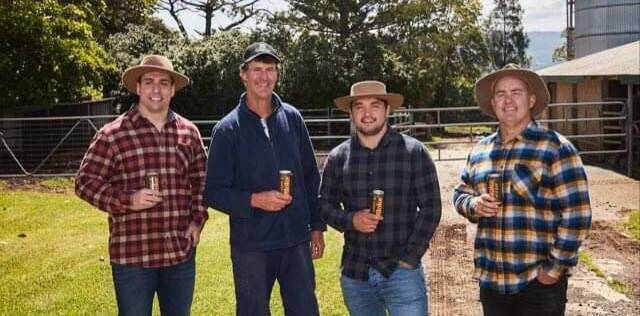 GREAT DAY: Gerroa dairy farmer Paul Condon (second from left) with Bloke In A Bar founder Denan Kemp, Melbourne Storm premiership winning player Brandon "The Block of Cheese" Smith and Mark "Piggy" Riddell.
