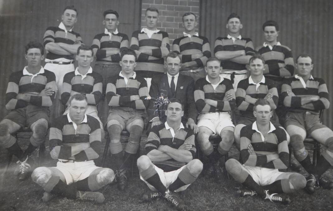 Jim Wilson (centre middle row) as manager of the South Coast - Berrima Rugby League rep Team Sydney 1925 (back row) H Hanrahan, N Morrissey, S Browne, A MacDonald, D McRae, W Pike. Middle row: C Bevan, L Jones, V Oliveria (captain), J Moss, E East, H Watts. Front: R Campbell, W Brooker, F Coleman.
