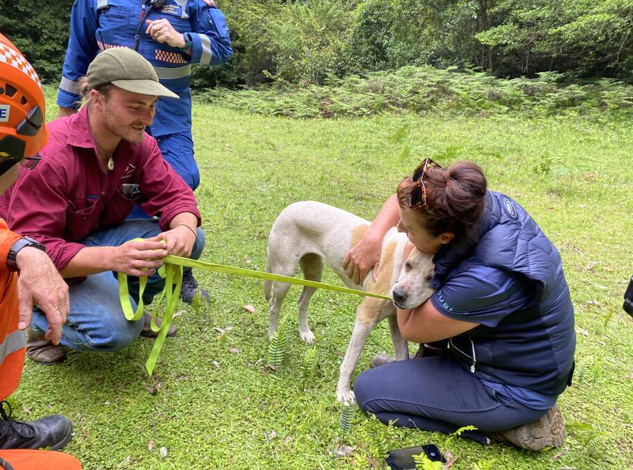 REUNITED: Tania Sharman and Will Baker with Lilly after she was rescued from her week missing in the wilds of Kangaroo Valley. Image: Supplied
