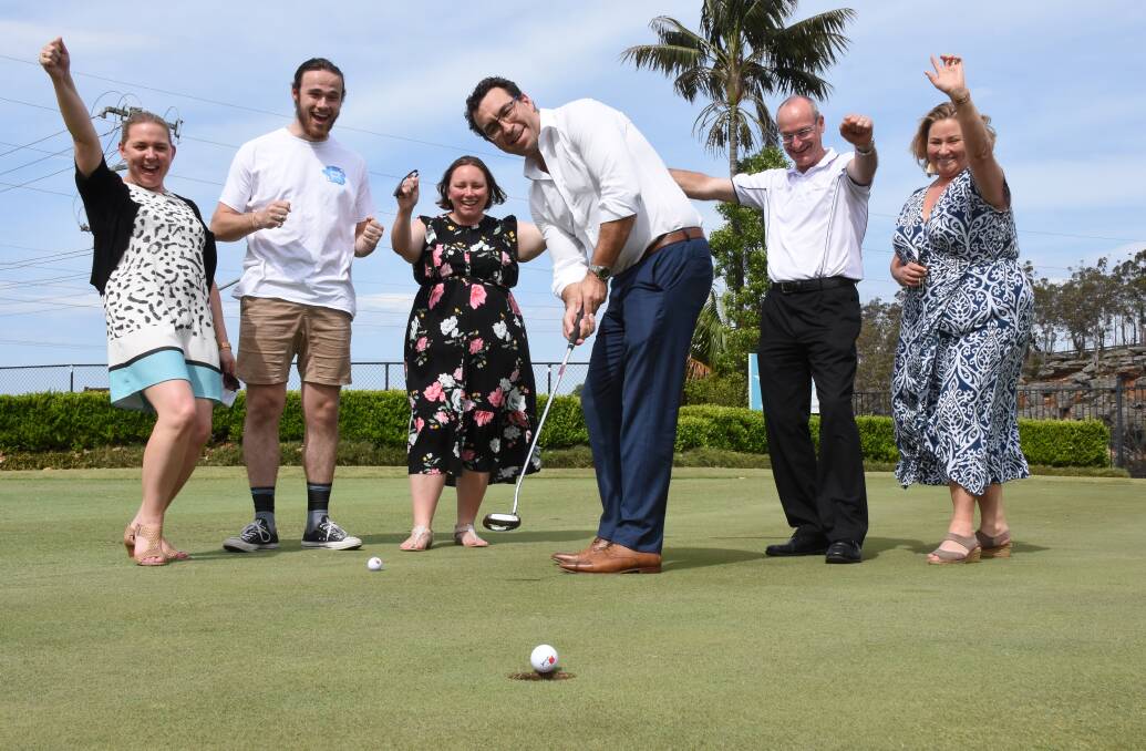 NAILED IT: Brendan Goddard, of Macey Insurance Brokers (centre) gets in some putting practice ahead of the sixth annual Shoalhaven Business Chamber Charity Golf Day with Clare Leslie, of SSPAN, Jordan Hockey, of Sonder Youth, Shoalhaven Business Chamber vice-president Hayley Byrne, Stephen Fornasier, of Shoalhaven Community Transport and SSPAN CEO Wendi Hobbs.