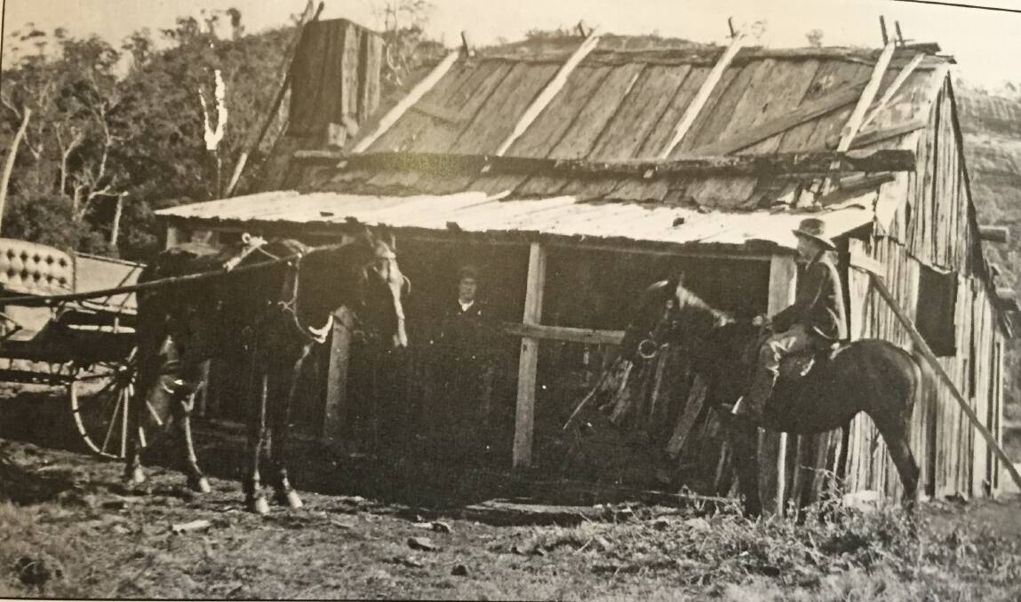 HISTORY: Mark Piercy's cabin 1912 in the doorway and James Sturgiss on horseback, Photo: Ken Blacket