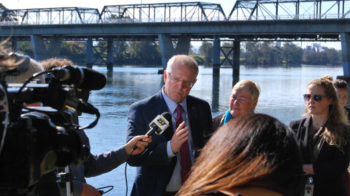 Federal Treasurer Scott Morrison says the government is looking closely at Ann Sudmalis' request for $1.28b funding for the Princes Highway. Photo: Hayley Warden
