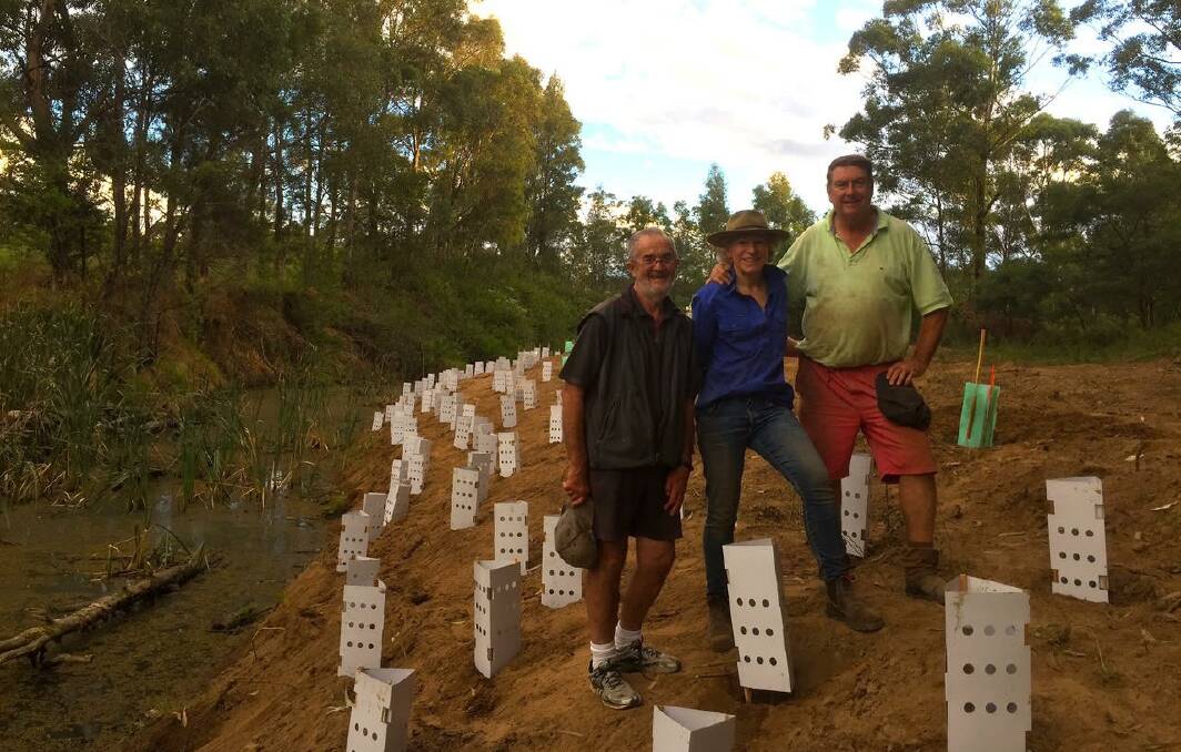 Tony Innis, Sally Bruderlin and Rob Bruderlin at the completion of the two-day tree planting at Cambewarra.