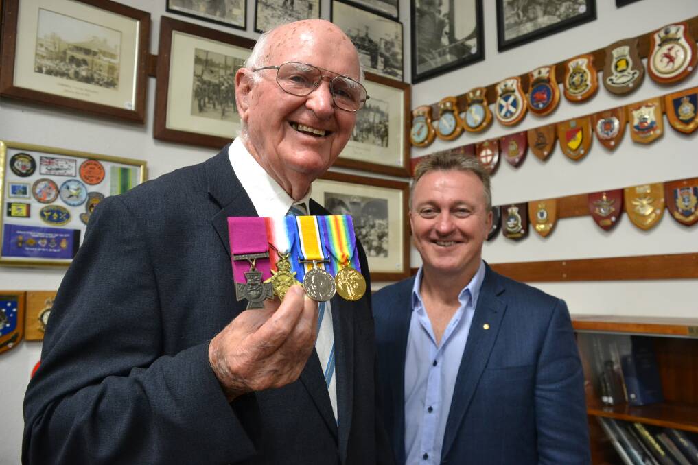 HISTORIC TOUR: Brian Kenny, proudly shows off his uncle Bede Kenny’s medals, including a replica Victoria Cross, he will take on a tour of the Western Front later this month led by Nowra RSL Sub-Branch secretary Rick Meehan.